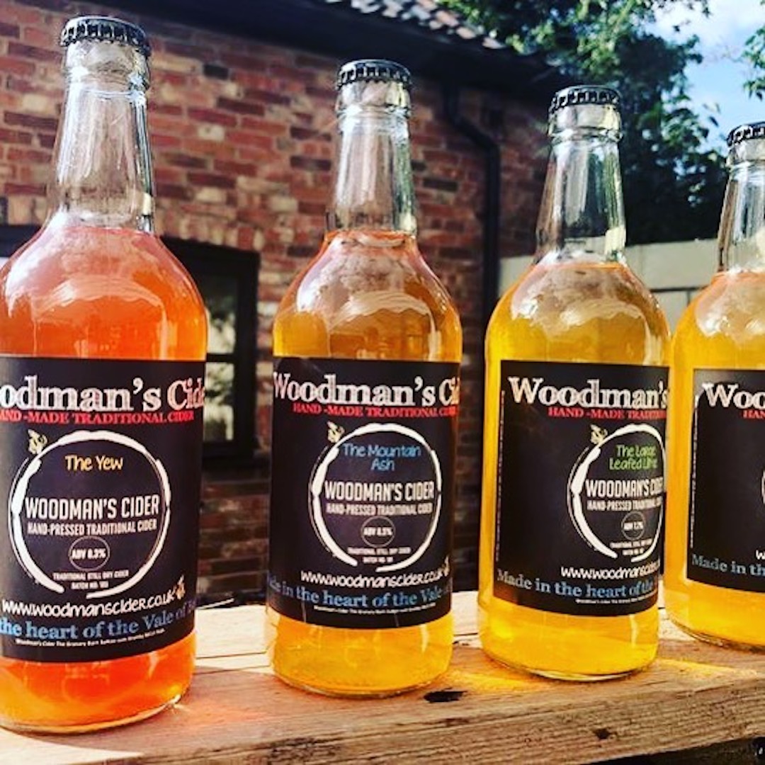 Woodman's Cider lifestyle logo