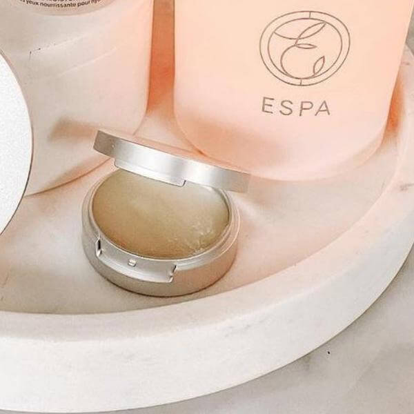 Image of Pomelo Lip Balm made in the UK by ESPA. Buying this product supports a UK business, jobs and the local community