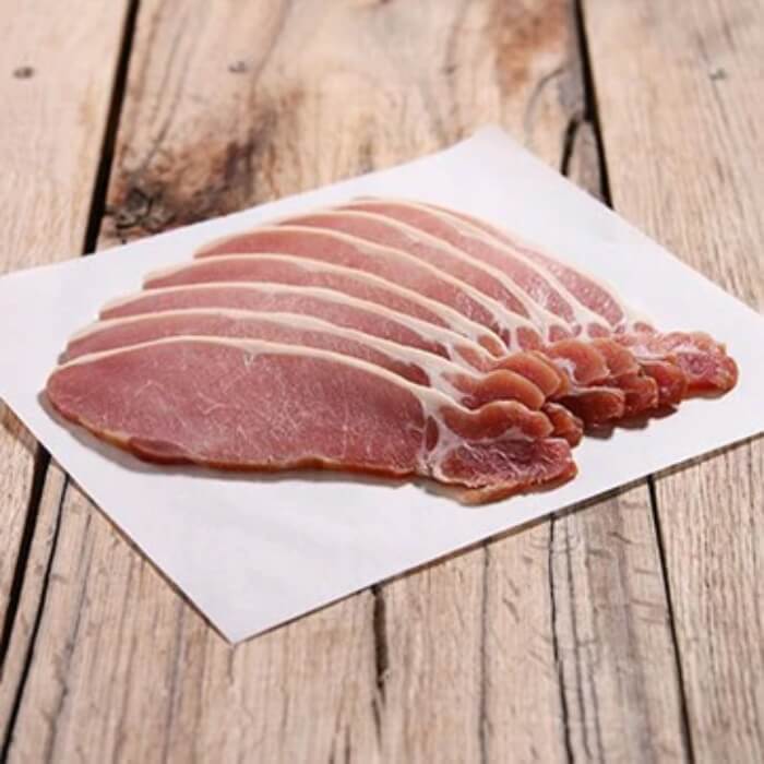 Image of Smoked Back Bacon by Eversfield Organic, designed, produced or made in the UK. Buying this product supports a UK business, jobs and the local community.