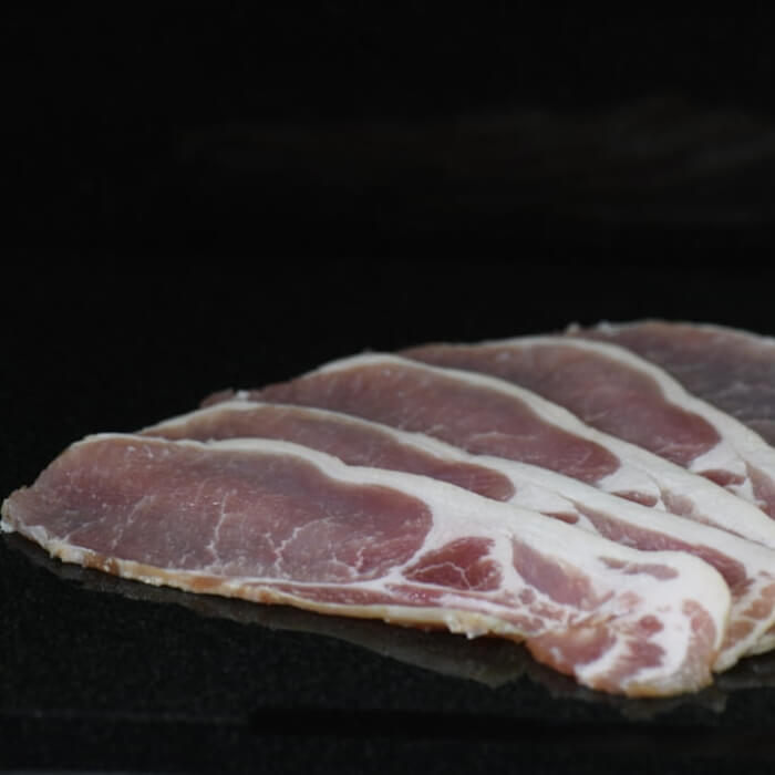 Image of Damn Delicoius Smoked Scottish Back Bacon made in the UK by Damn Delicious. Buying this product supports a UK business, jobs and the local community
