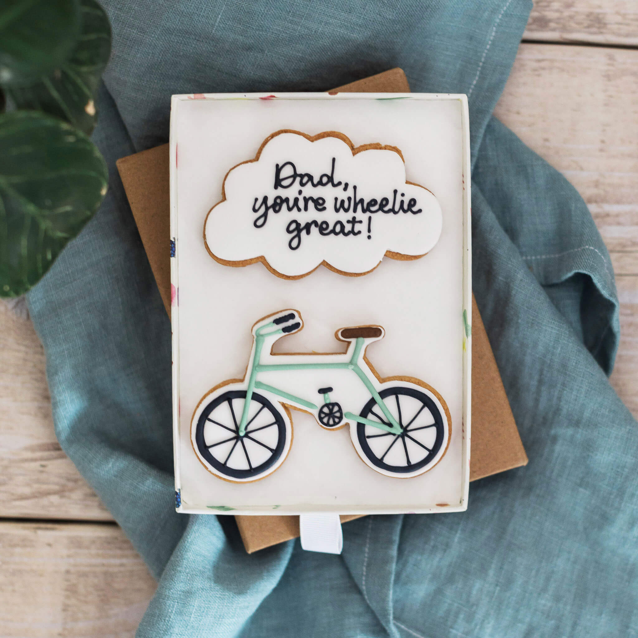 Image of Personalised Bicycle Biscuit Gift by Honeywell Bakes, designed, produced or made in the UK. Buying this product supports a UK business, jobs and the local community.