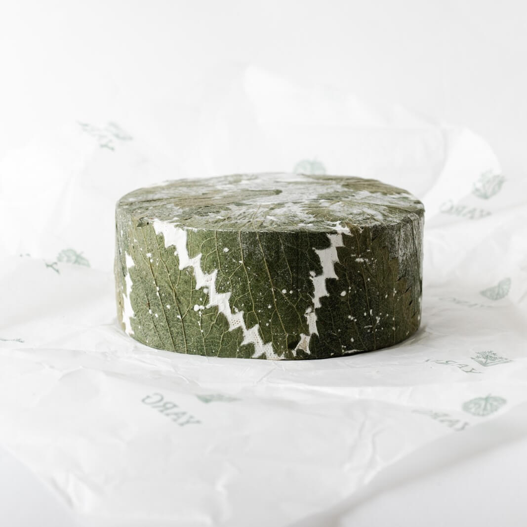 Image of Cornish Yarg by Lynher Dairies for Hard Cheese, designed, produced or made in the UK. Buying this product supports a UK business, jobs and the local community.