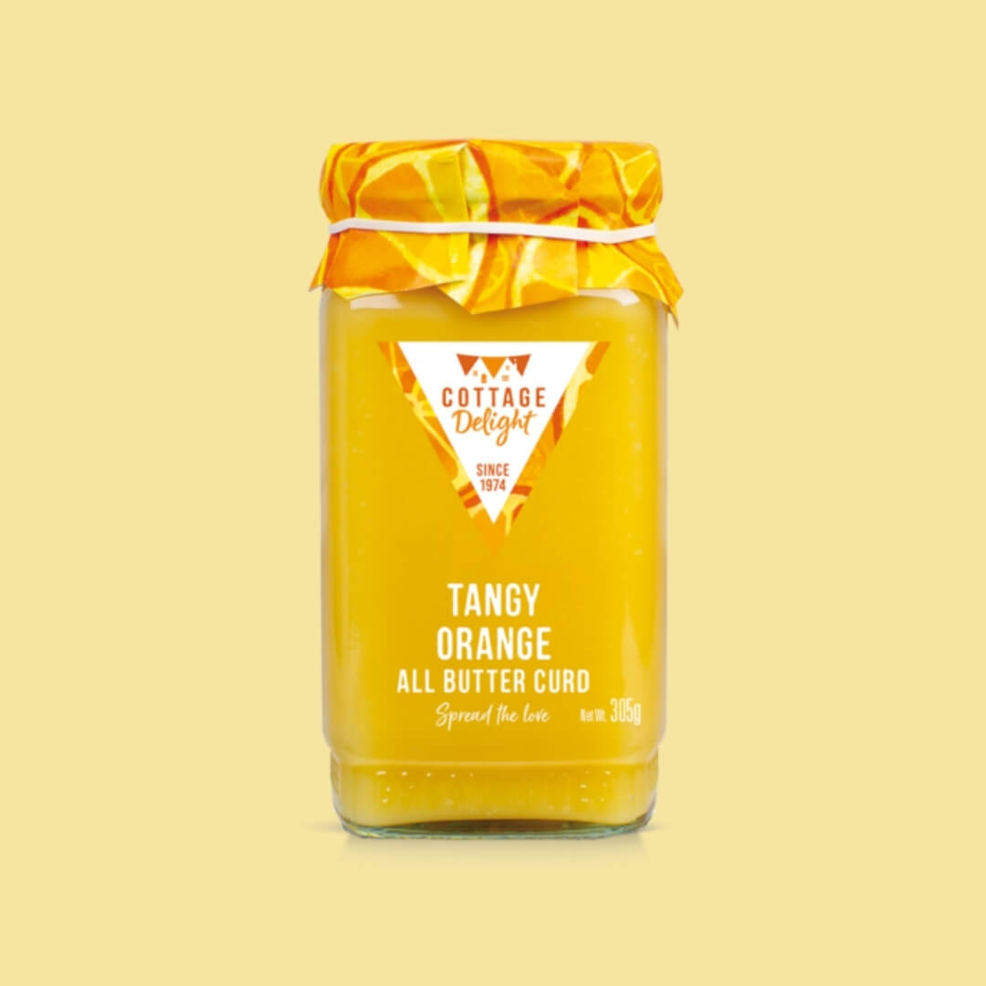 Image of Tangy Orange All Butter Curd made in the UK by Cottage Delight. Buying this product supports a UK business, jobs and the local community