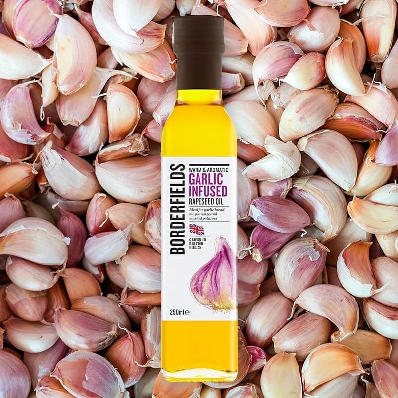 Image of Garlic Infused Rapeseed Oil made in the UK by Borderfields. Buying this product supports a UK business, jobs and the local community