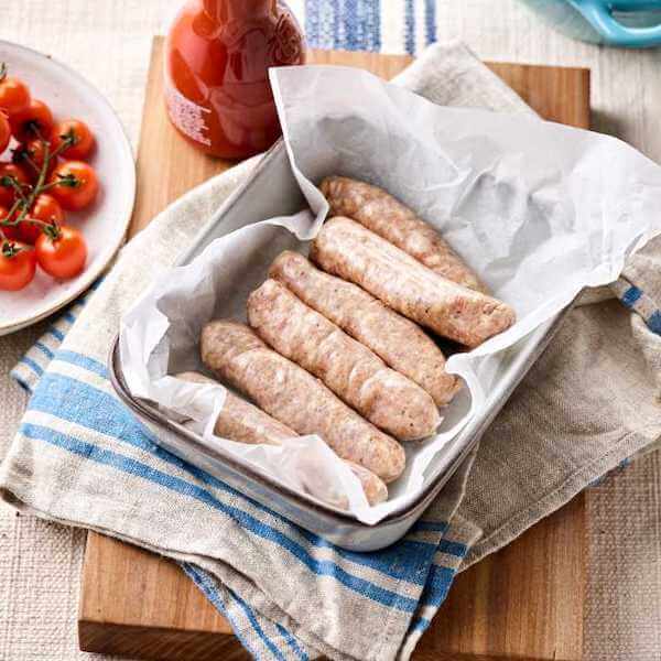 Image of Pork Sausages made in the UK by Coombe Farm Organic. Buying this product supports a UK business, jobs and the local community