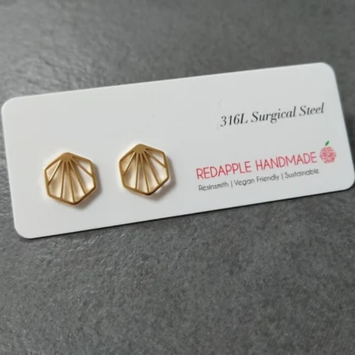 Image of Handmade Sunburst Hexagon Stud Earrings by RedApple, designed, produced or made in the UK. Buying this product supports a UK business, jobs and the local community.