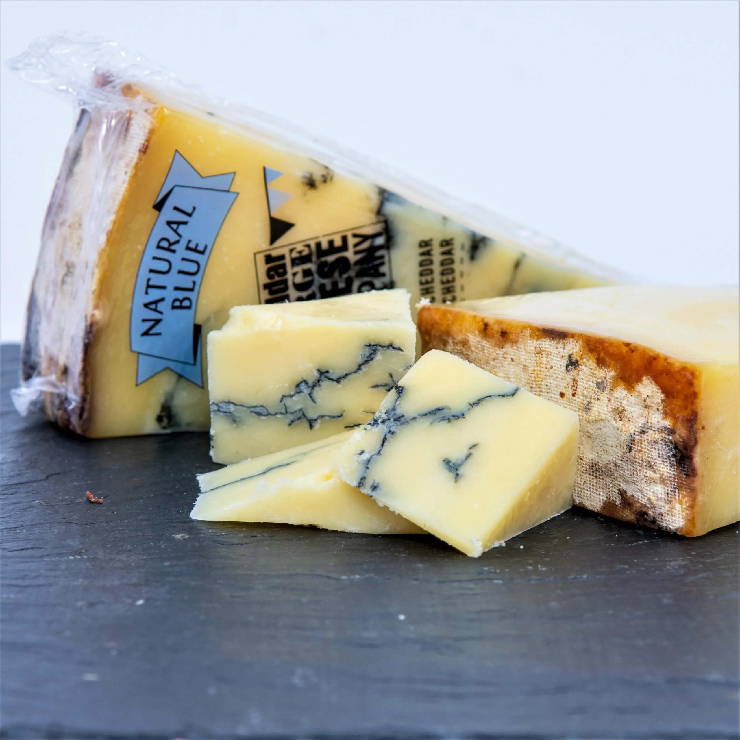 Image of Cheddar Gorge Natural Blue Cheddar made in the UK by The Cheddar Gorge Cheese Company. Buying this product supports a UK business, jobs and the local community