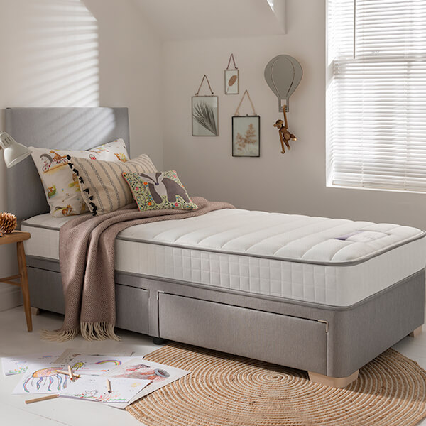 Image of Healthy Growth Miracoil Sprung Mattress made in the UK by Silentnight. Buying this product supports a UK business, jobs and the local community