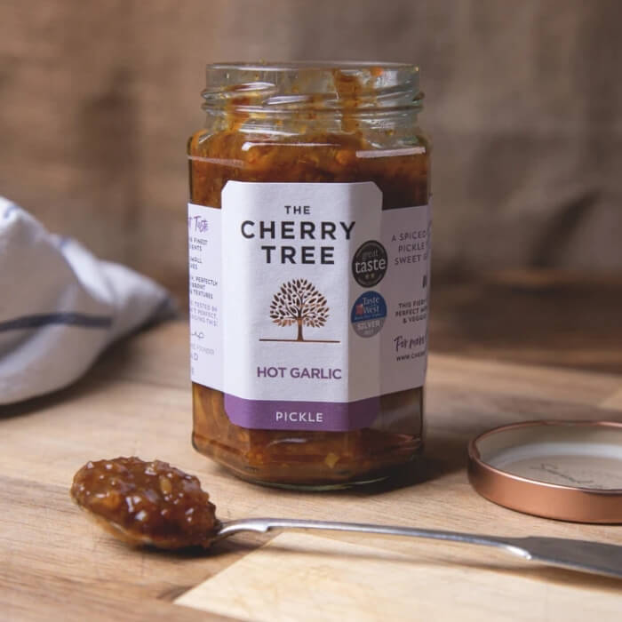 Image of Hot Garlic Pickle made in the UK by The Cherry Tree. Buying this product supports a UK business, jobs and the local community